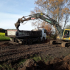 Teichentschlammung bei Kuensdorf mit Raupe und Lkw